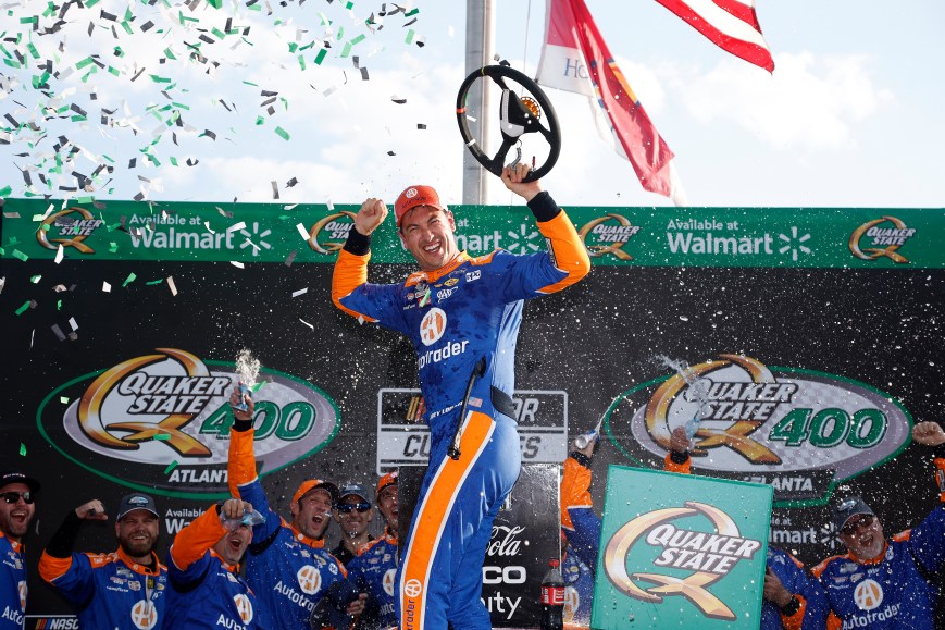 Logano Secures Playoff Spot with Overtime Victory at Atlanta